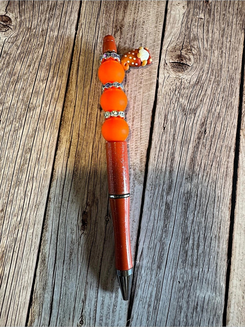 Orange gnome charm pen